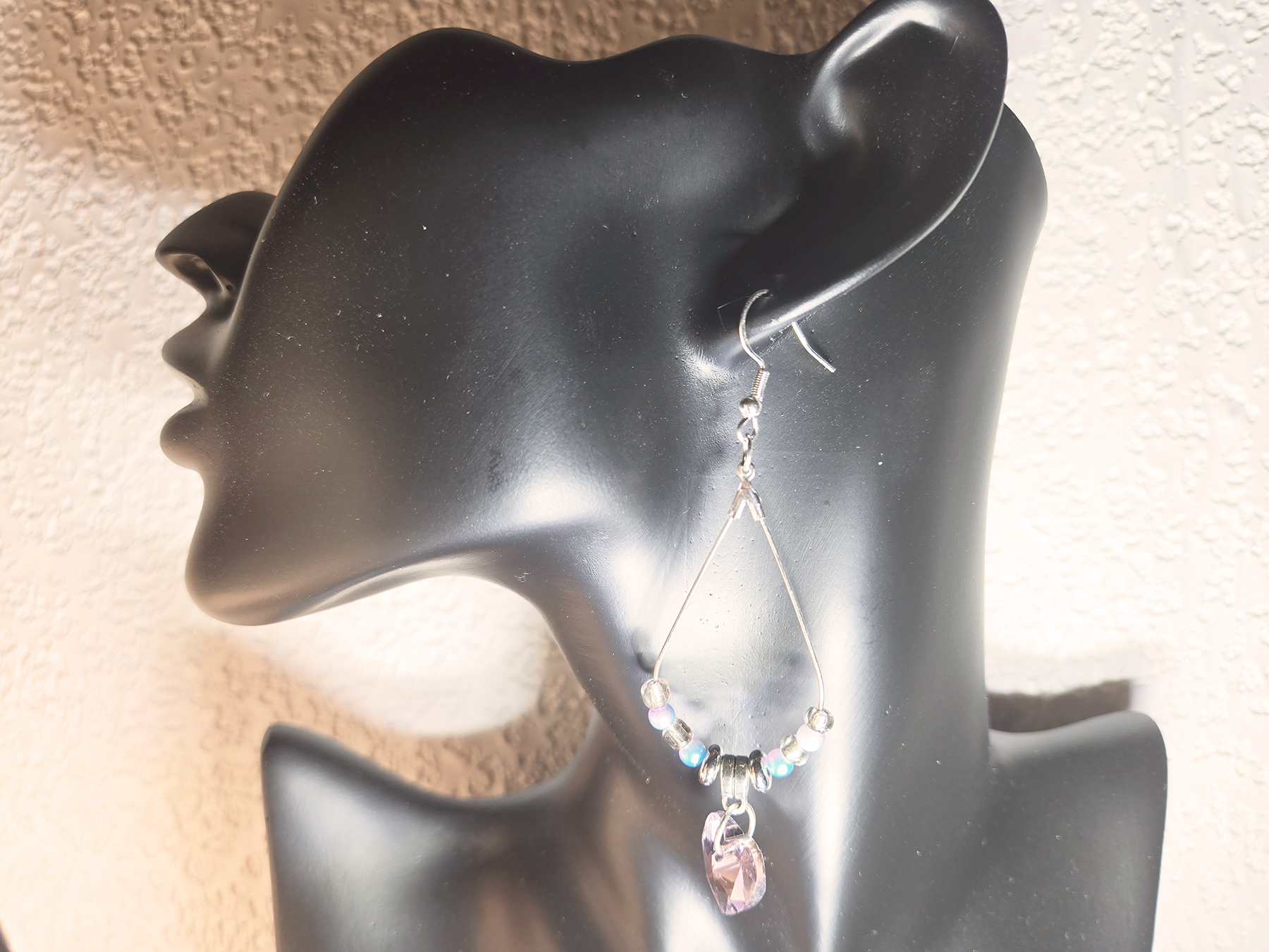 Silvery Teardrop Earrings with Charm